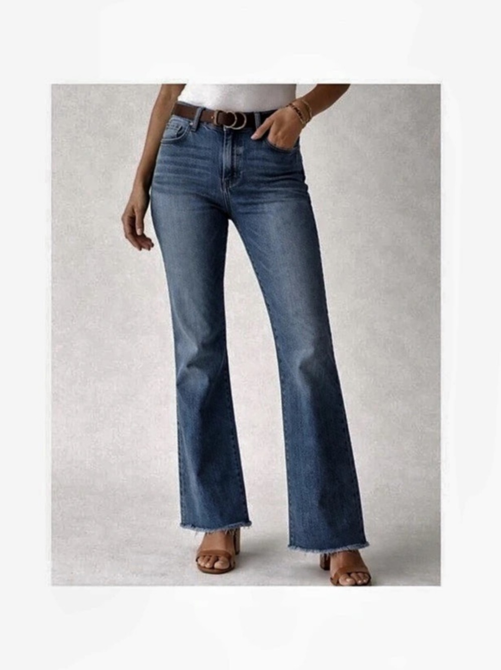 Paige High Rise Laurel Canyon Flare Jeans in Blue Raw Hem